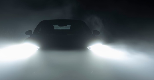 Car driving in the fog